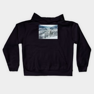 Wintertime - View on Snow-Covered Scandinavian Valley and Town Kids Hoodie